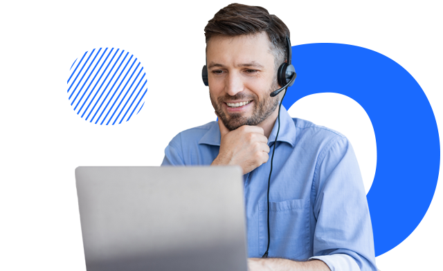  A person looking at a laptop and talking into a microphone