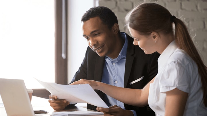Two people working together at the office