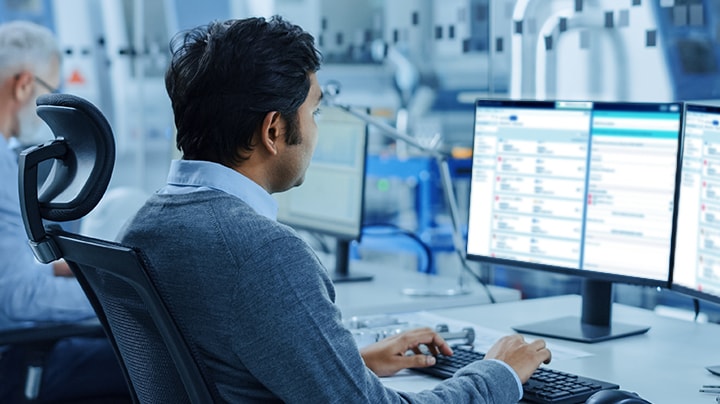 A person reviewing regulatory information on a computer