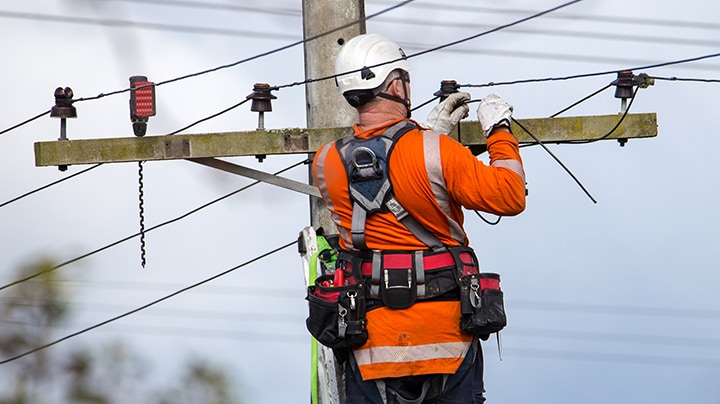 A Person working on electrical power line