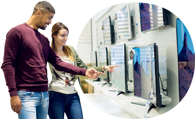 Two people in electronics store looking at television