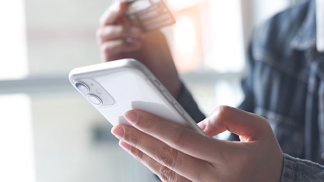 A person using a phone.